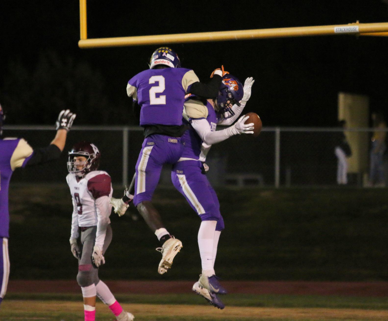 Tigers stay hot with 42-6 rout of Pioneers, clinch playoff spot